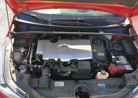 2021 Toyota Prius L Eco z USA, uszkodzony, nr VIN JTDKAMFUXM3133862